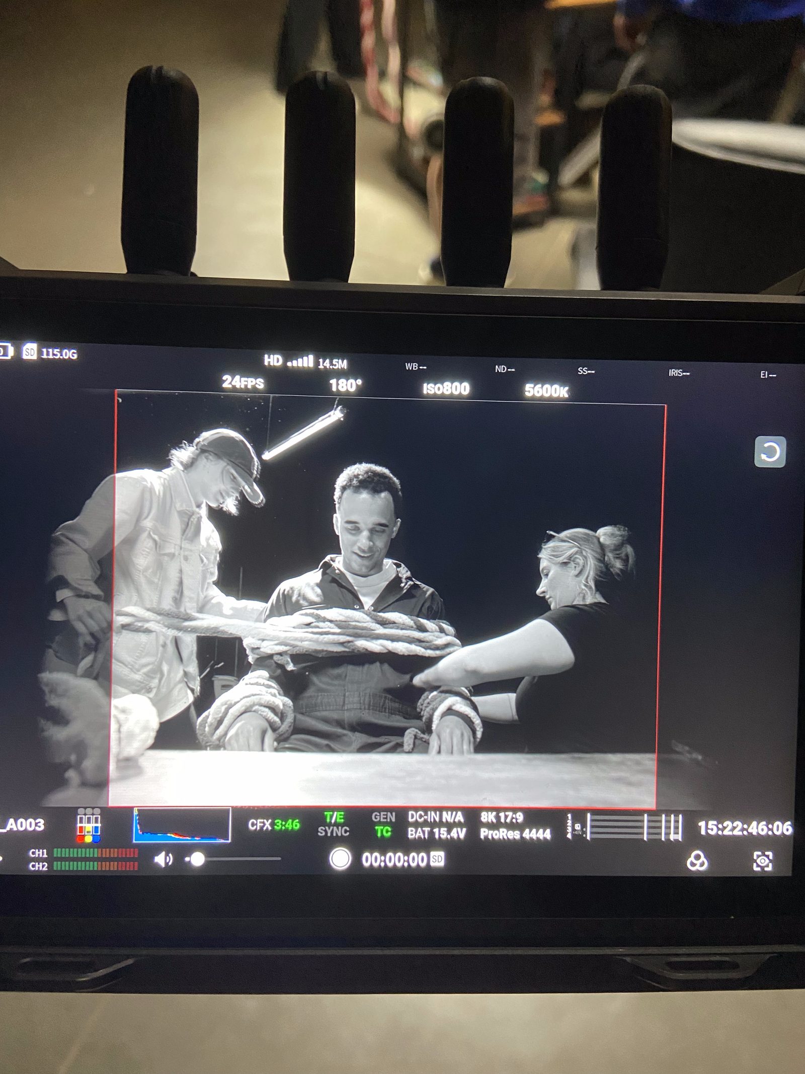 Camera monitor view of an actor bound with rope during the 48 Hour Film Project shoot for String Theory